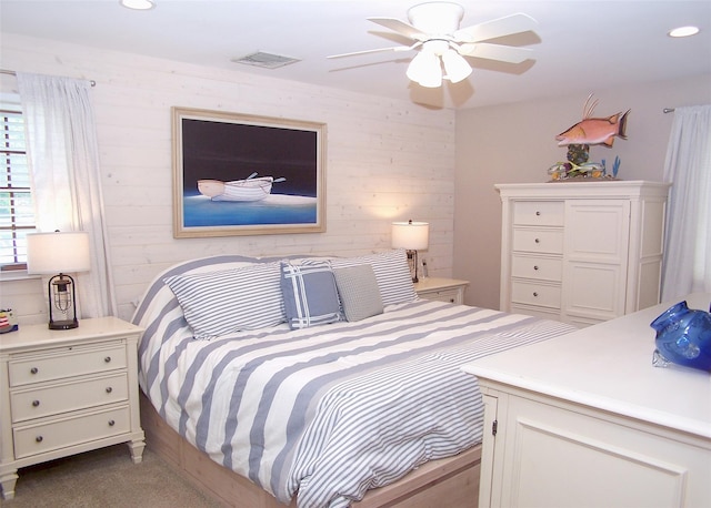 68 Palmer Dr, Sayville, NY 11782 - bedroom with recessed lighting, carpet, wooden walls, and ceiling fan