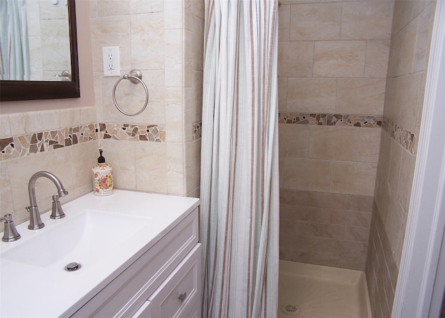 68 Palmer Dr, Sayville, NY 11782 - bathroom with tile walls, a stall shower, vanity, and backsplash