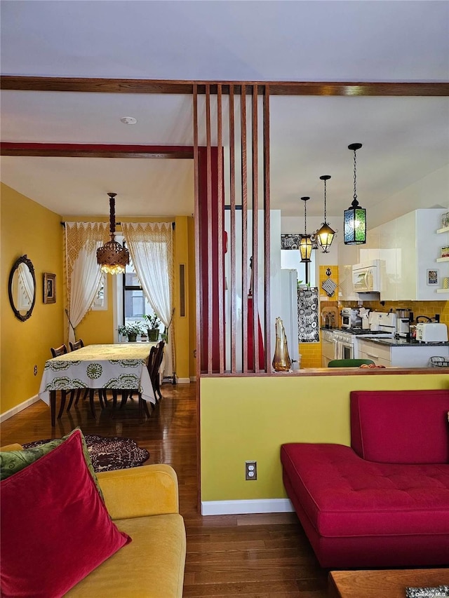616 W 137th St Unit 1D, New York Manhattan, NY 10031 - living room with wood finished floors and baseboards