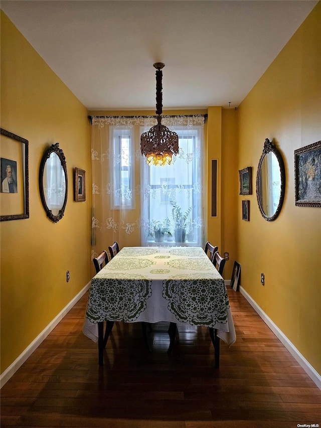 616 W 137th St Unit 1D, New York Manhattan, NY 10031 - dining room featuring dark wood-style flooring and a chandelier