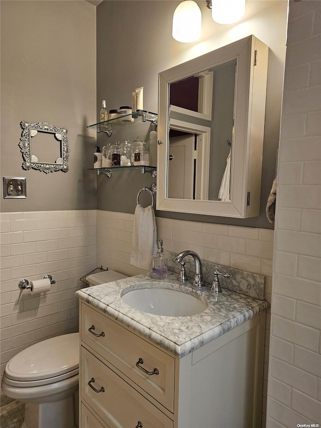 616 W 137th St Unit 1D, New York Manhattan, NY 10031 - bathroom featuring vanity and tile walls