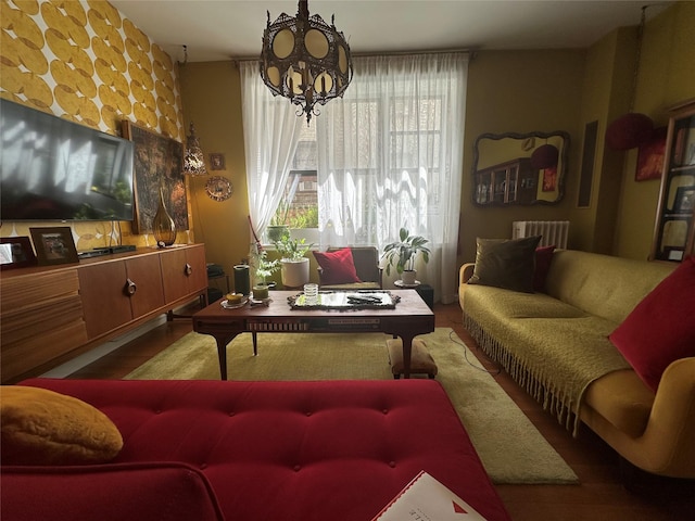 616 W 137th St Unit 1D, New York Manhattan, NY 10031 - living room with wood finished floors and a chandelier