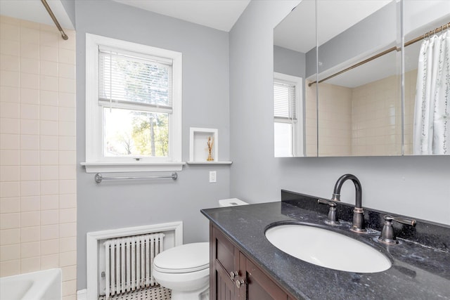18 Hathaway Dr, Garden City, NY 11530 - full bath with radiator, vanity, and shower / tub combo