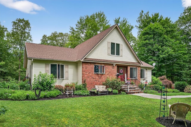 189 School House Rd, Middletown, NY 10940 - view of front of house featuring a front yard and brick siding