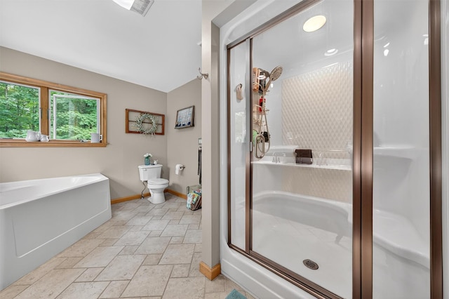 189 School House Rd, Middletown, NY 10940 - bathroom featuring stone tile floors, a shower stall, and a bath
