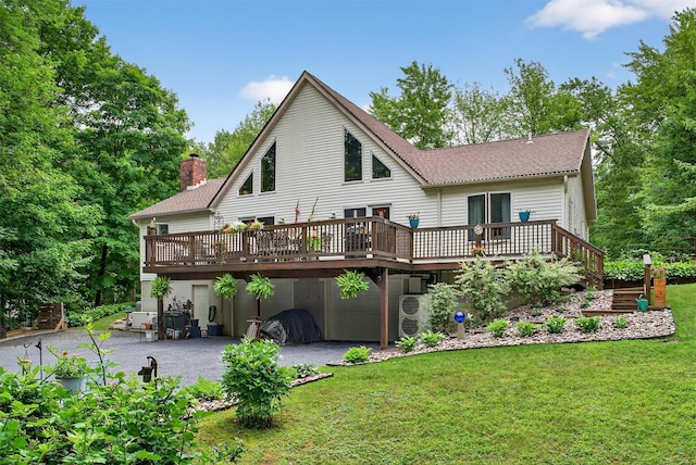 189 School House Rd, Middletown, NY 10940 - rear view of property with a deck, a shingled roof, a lawn, and driveway