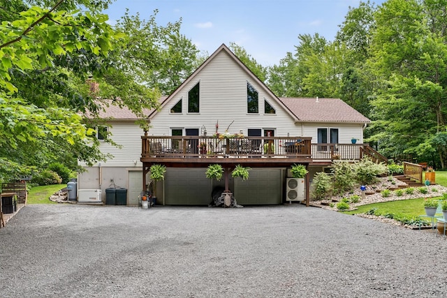 189 School House Rd, Middletown, NY 10940 - view of front facade featuring a wooden deck, a shingled roof, and an attached garage