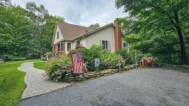 189 School House Rd, Middletown, NY 10940 - view of property exterior featuring a chimney, a lawn, and roof with shingles