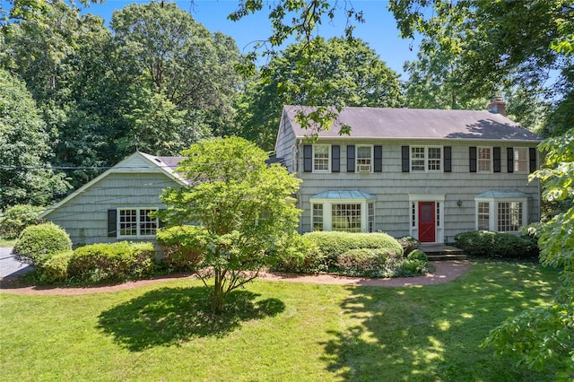 6 Beardsley Ln, Lloyd Harbor, NY 11743 - colonial house with a chimney and a front yard