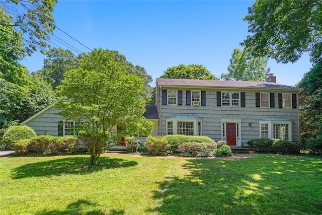 6 Beardsley Ln, Lloyd Harbor, NY 11743 - colonial house featuring a chimney and a front yard