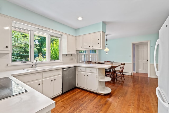 6 Beardsley Ln, Lloyd Harbor, NY 11743 - kitchen featuring dishwasher, freestanding refrigerator, light countertops, white cabinets, and recessed lighting