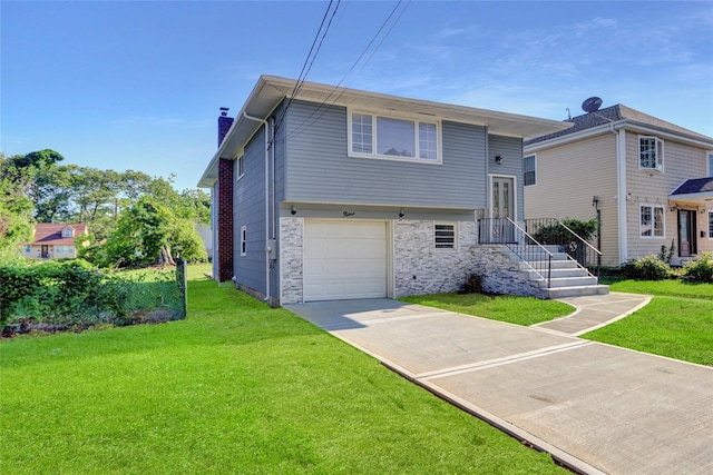 9 Rhodes Ln, West Hempstead, NY 11552 - view of front facade featuring a chimney, a front yard, driveway, a garage, and stone siding