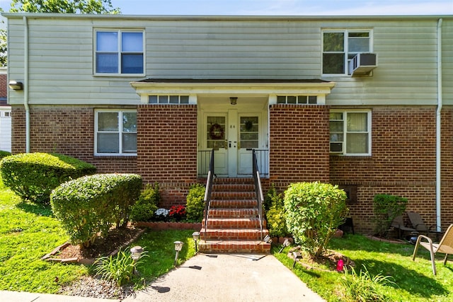 84 Spruce St Unit 1A, Yonkers, NY 10701 - traditional home with brick siding and cooling unit