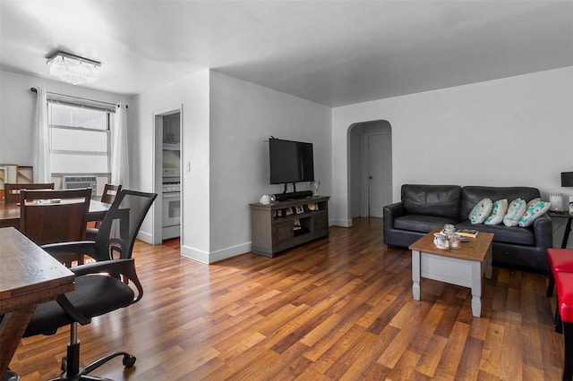 84 Spruce St Unit 1A, Yonkers, NY 10701 - living room with arched walkways, wood finished floors, and cooling unit