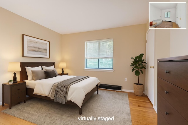 156 Creamery Rd Unit Tr20, Swan Lake, NY 12783 - bedroom with light wood-type flooring and multiple windows