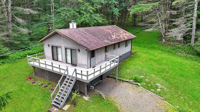 156 Creamery Rd Unit Tr20, Swan Lake, NY 12783 - rear view of property with a yard, roof with shingles, stairway, and driveway