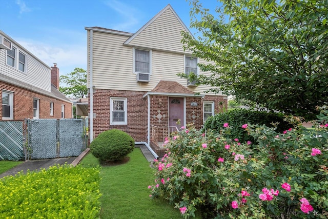 5802 201st St, Bayside, NY 11364 - view of front facade with brick siding and cooling unit