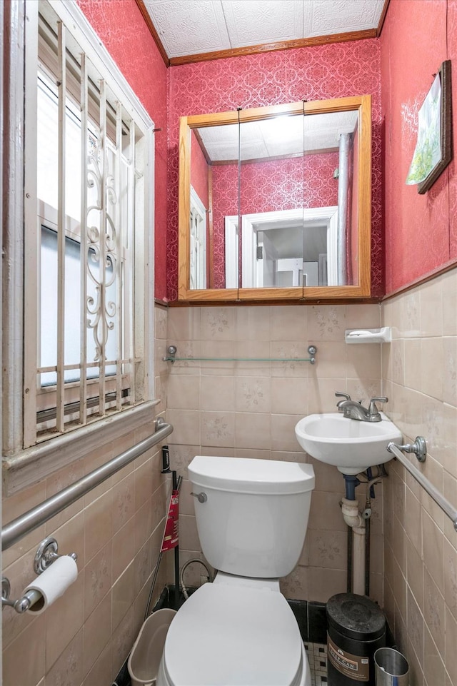 5802 201st St, Bayside, NY 11364 - half bathroom with plenty of natural light, tile walls, and wallpapered walls