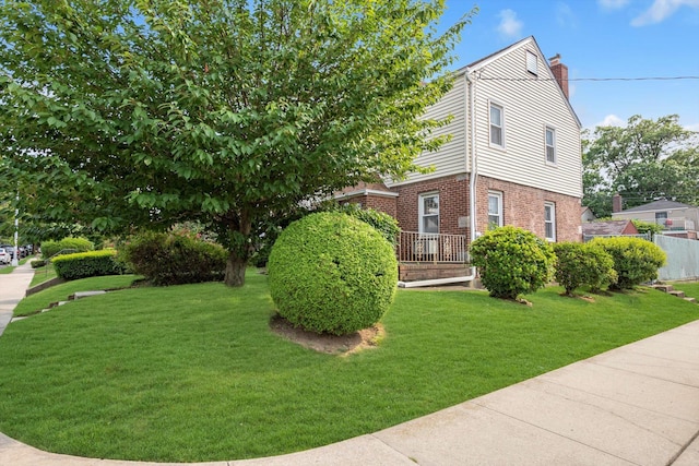 5802 201st St, Bayside, NY 11364 - view of front of house featuring a chimney and brick siding