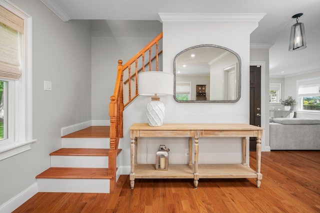 1299 Williams Dr, Shrub Oak, NY 10588 - stairs featuring wood finished floors, crown molding, and recessed lighting
