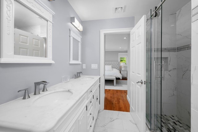 1299 Williams Dr, Shrub Oak, NY 10588 - full bathroom featuring a marble finish shower, double vanity, marble look tiles, and ensuite bath