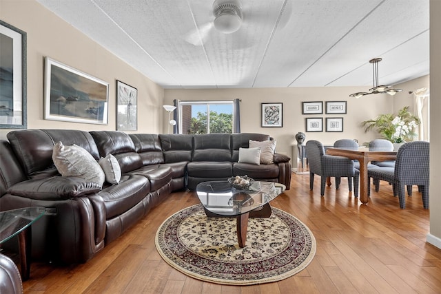 414 Benedict Ave Unit 5B, Tarrytown, NY 10591 - living area with light wood-type flooring, ceiling fan, and a textured ceiling