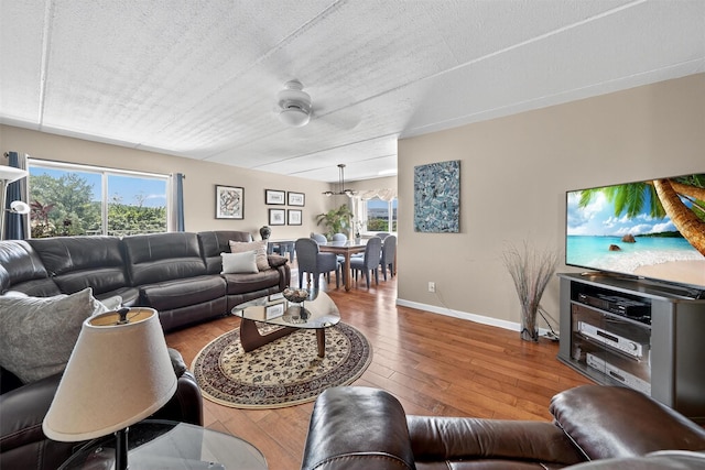 414 Benedict Ave Unit 5B, Tarrytown, NY 10591 - living area featuring healthy amount of natural light, hardwood / wood-style floors, and ceiling fan