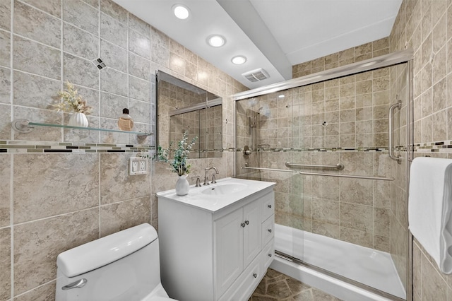 414 Benedict Ave Unit 5B, Tarrytown, NY 10591 - full bath featuring tile walls, vanity, a shower stall, and recessed lighting