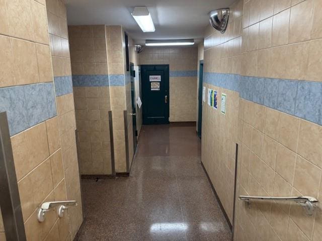1439 Metropolitan Ave Unit 5H, Bronx, NY 10462 - hall featuring tile walls