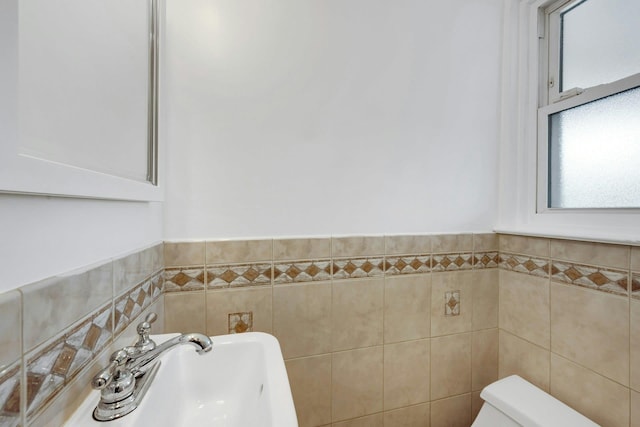1138 Vincent Ave, Bronx, NY 10465 - bathroom with tile walls and a wainscoted wall