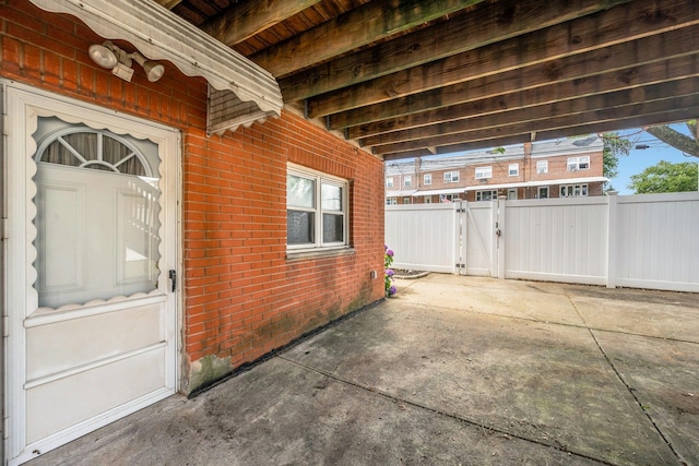 1138 Vincent Ave, Bronx, NY 10465 - view of patio featuring a gate