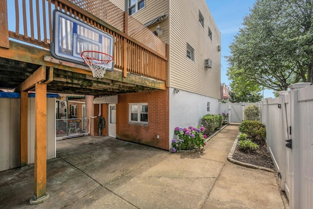 1138 Vincent Ave, Bronx, NY 10465 - view of basketball court with a gate and a fenced backyard