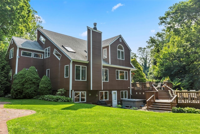 8 Braemer Rd, East Setauket, NY 11733 - back of property with a hot tub, a deck, a chimney, a shingled roof, and a lawn