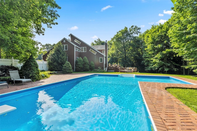 8 Braemer Rd, East Setauket, NY 11733 - outdoor pool featuring a diving board and a wooden deck