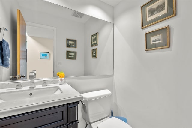 8 Braemer Rd, East Setauket, NY 11733 - bathroom with toilet and vanity