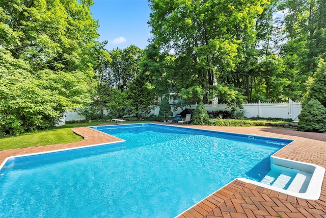 8 Braemer Rd, East Setauket, NY 11733 - view of swimming pool featuring a fenced backyard, a patio area, and view of scattered trees