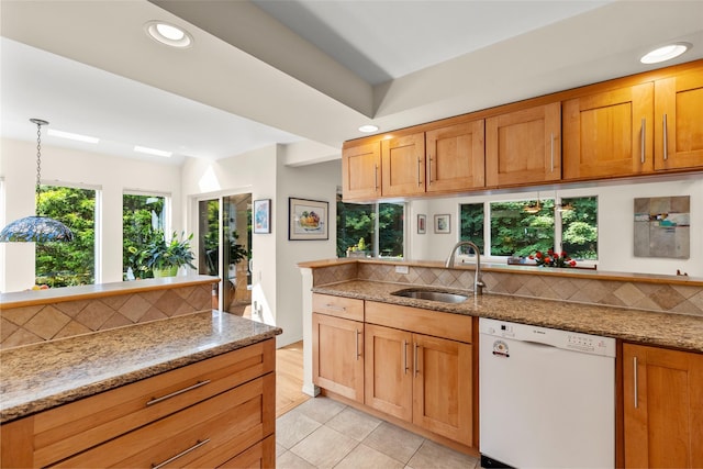 8 Braemer Rd, East Setauket, NY 11733 - kitchen featuring white dishwasher, tasteful backsplash, light stone countertops, and recessed lighting