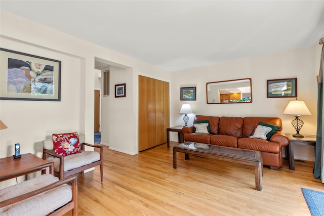 8 Braemer Rd, East Setauket, NY 11733 - living area with light wood-style floors and baseboards