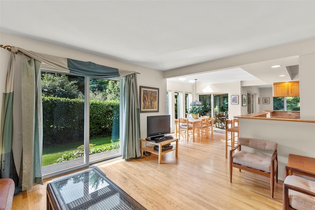 8 Braemer Rd, East Setauket, NY 11733 - living room with light wood finished floors, plenty of natural light, and recessed lighting