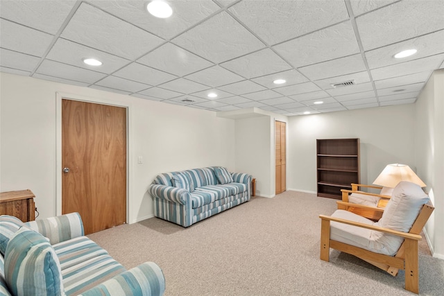 8 Braemer Rd, East Setauket, NY 11733 - carpeted living room with recessed lighting and a paneled ceiling