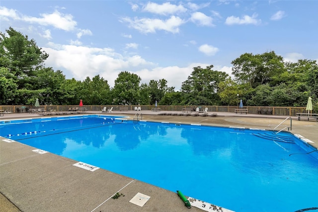 41 Millholland Dr, Fishkill, NY 12524 - community pool with a patio area and view of scattered trees