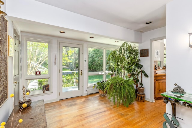 5 Shore Dr, Setauket, NY 11733 - sitting room featuring light wood finished floors and healthy amount of natural light