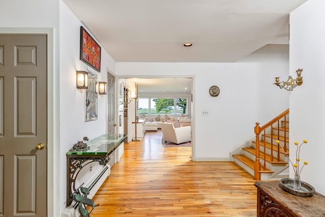 5 Shore Dr, Setauket, NY 11733 - hall with light wood-style floors, stairs, and recessed lighting