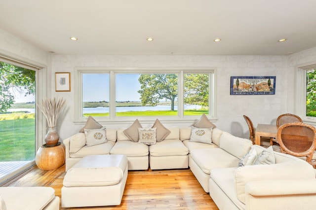 5 Shore Dr, Setauket, NY 11733 - living room with a water view, light wood-style floors, and recessed lighting
