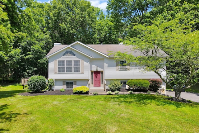 5 Thompson Ct, Campbell Hall, NY 10916 - raised ranch featuring a front yard and a chimney