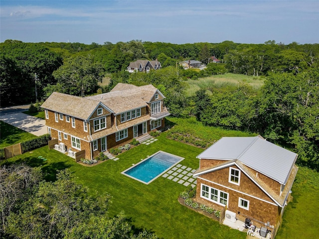 161 S Rd, Westhampton, NY 11977 - view of subject property with a heavily wooded area and a pool