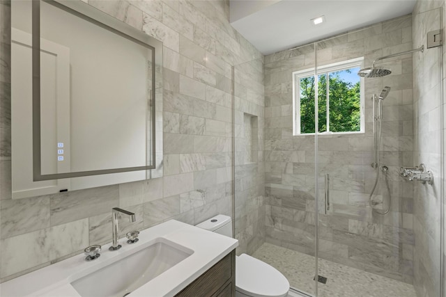 161 S Rd, Westhampton, NY 11977 - bathroom featuring vanity, a shower stall, and tile walls