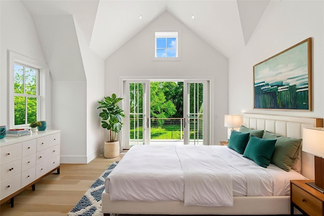 161 S Rd, Westhampton, NY 11977 - bedroom with light wood-style flooring and high vaulted ceiling