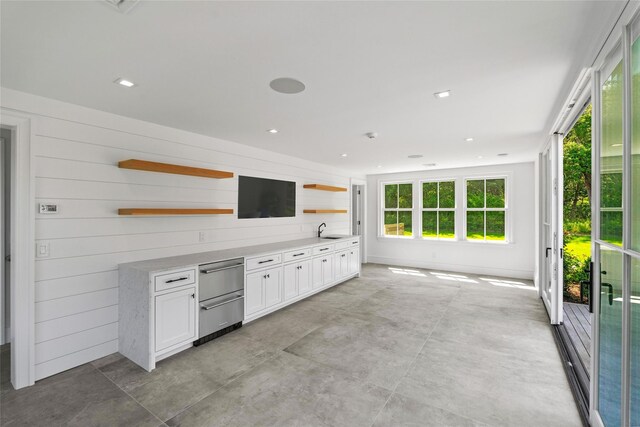 161 S Rd, Westhampton, NY 11977 - bar featuring a sink and wood walls