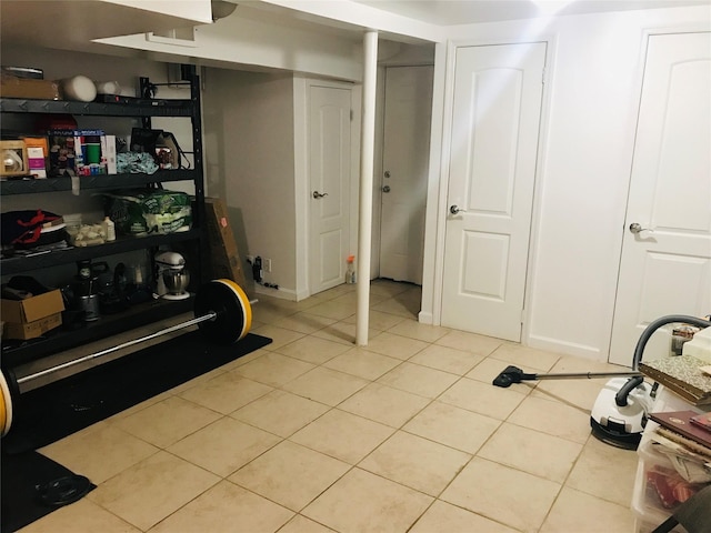 92-38 77th St, Woodhaven, NY 11421 - below grade area with light tile patterned flooring
